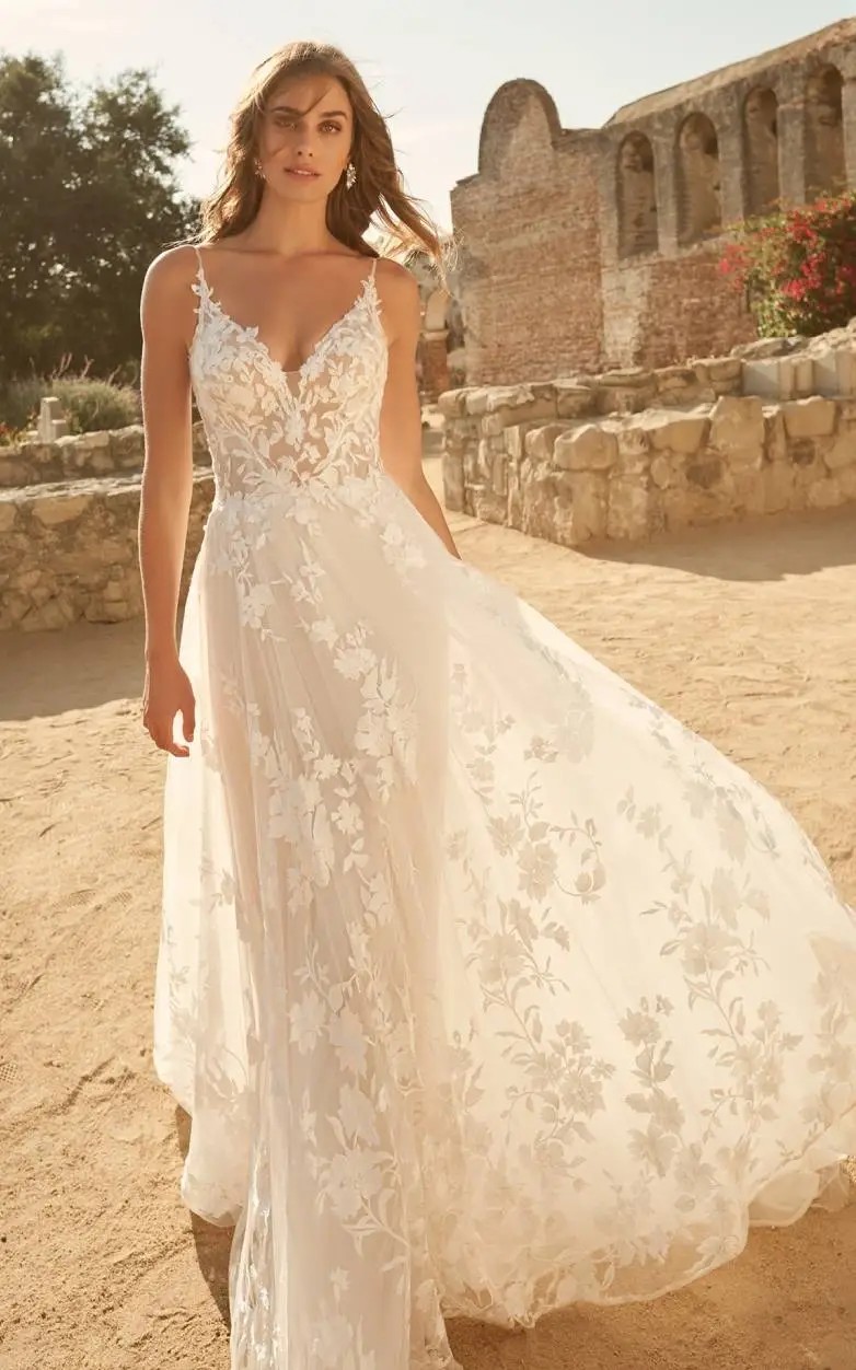 Photo of the model wearing a Bridal collection gown