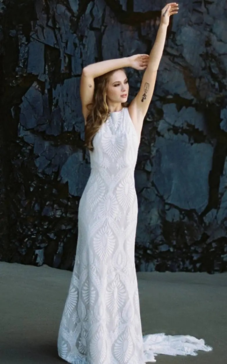 Photo of the model wearing a Bridal collection gown