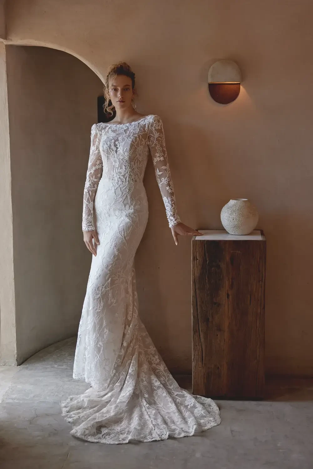 Photo of the model wearing a Bridal collection gown